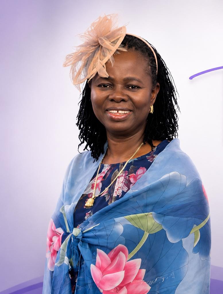 Madam Theresa, owner of Tessy Hair Braiding